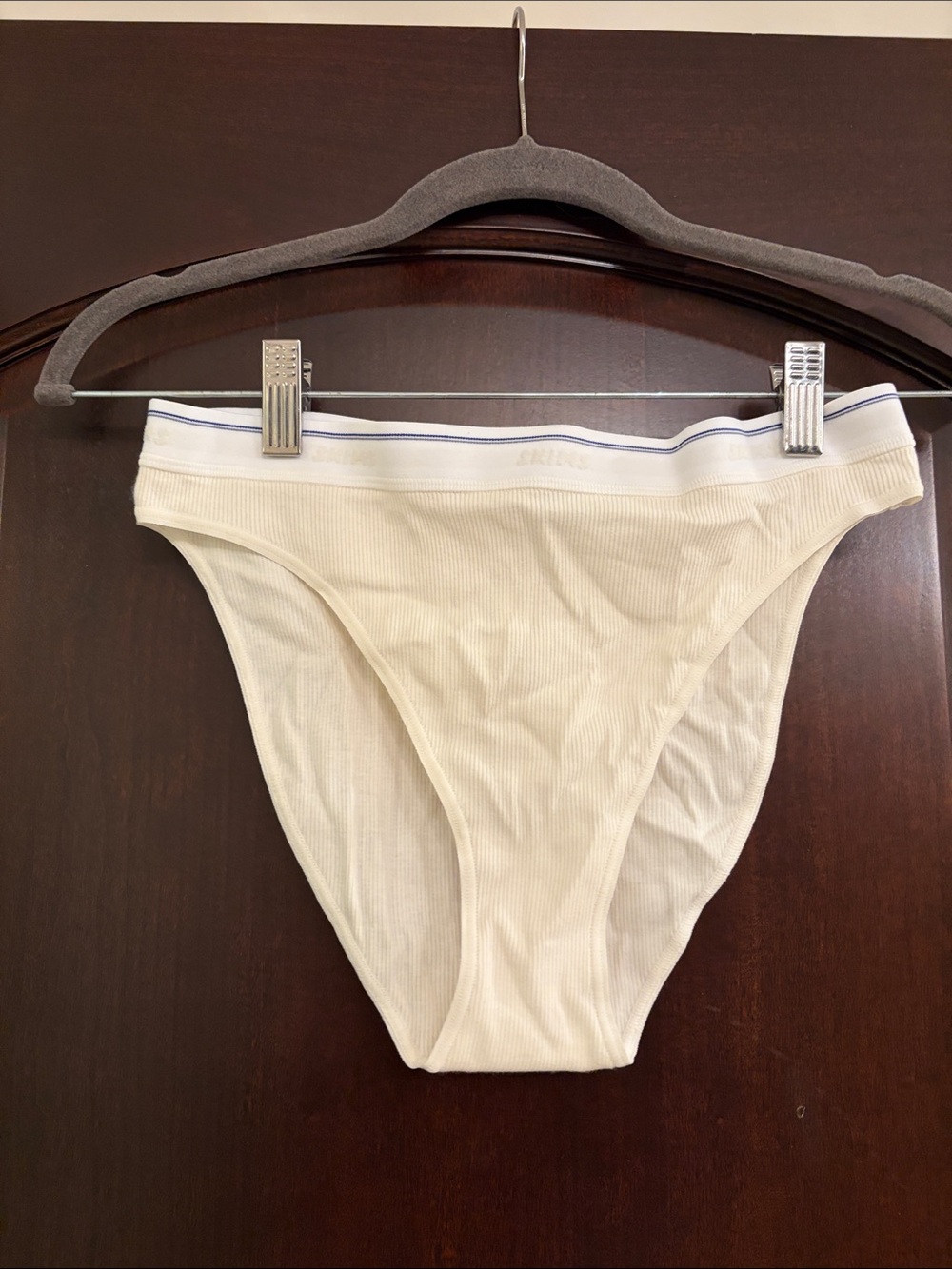 SKIMS Ribbed High-Cut Bikini Panty in Cream with Blue Trim